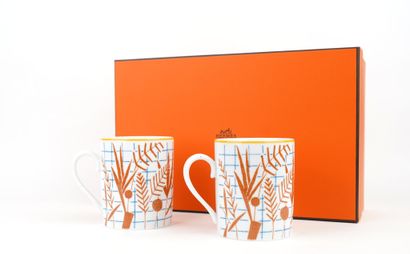 HERMES
Paire de tasses mugs en porcelaine,...
