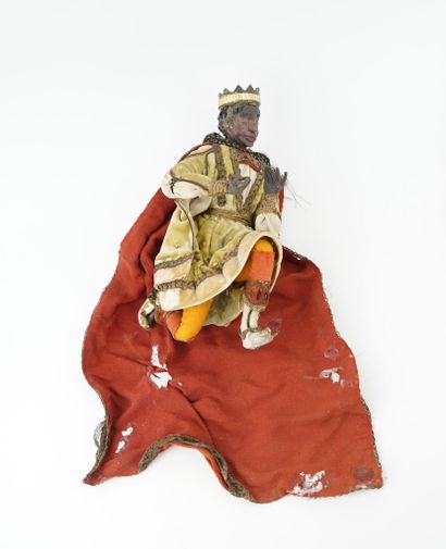Santon figurant un roi mage en bois, tissu...
