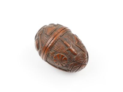 Porte chapelet en noix de corozo sculptée
Décor...