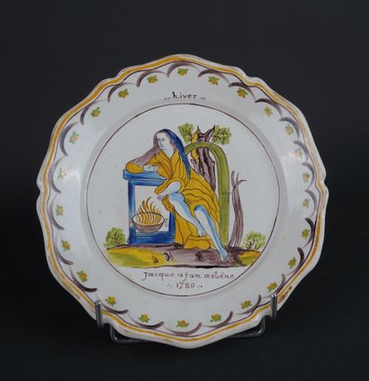 NEVERS
Suite de quatre assiettes en faïence...