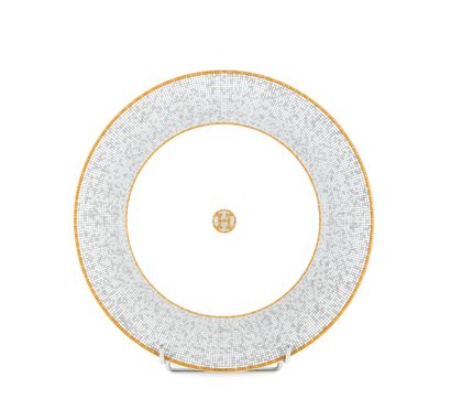 HERMES
Plat de service en porcelaine, modèle...