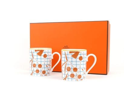 HERMES
Paire de tasses mugs en porcelaine,...