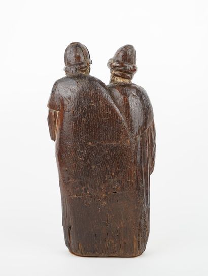 Couple de personnages en chêne sculpté, dos...