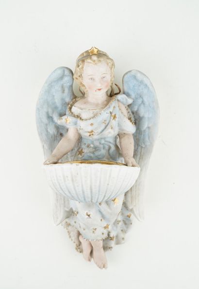 Bénitier en porcelaine à décor d'ange tenant...