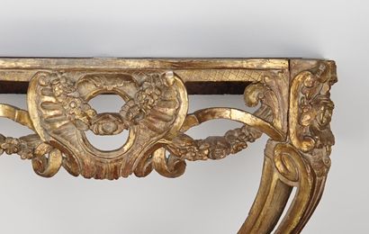 Console en bois mouluré, sculpté et doré...