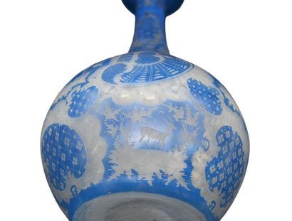 Set of three glass cameo bottles and covered...