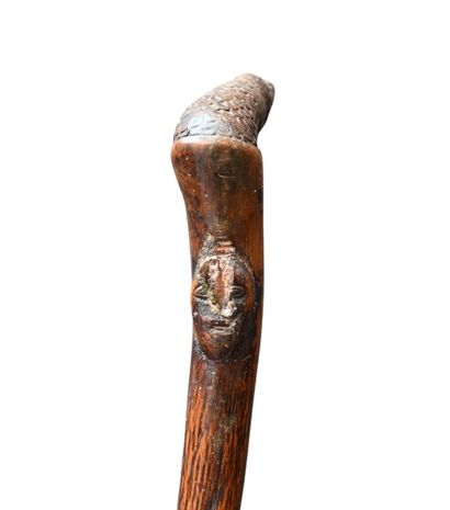 One-piece carved wooden cane with crocodile-shaped...