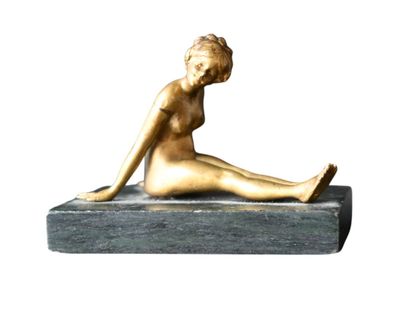 Small ormolu figure of a reclining female...