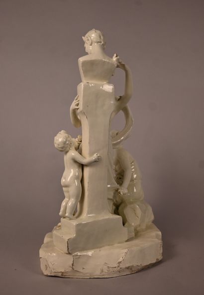 Groupe allégorique au faune, faïence émaillée,...