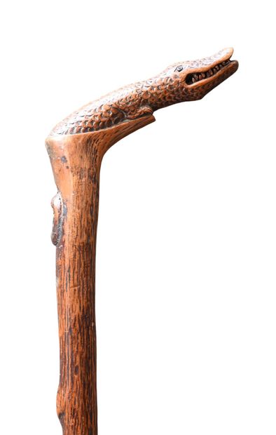 One-piece carved wooden cane with crocodile-shaped...