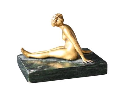 Small ormolu figure of a reclining female...