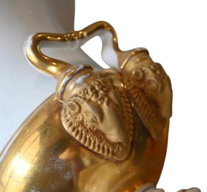 Pair of gilded and white porcelain urn vases,...
