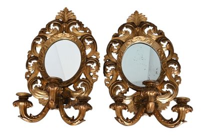 Pair of carved and gilded wood girandole...