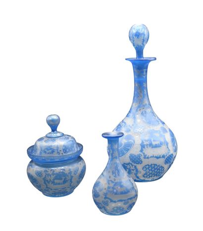 Set of three glass cameo bottles and covered...