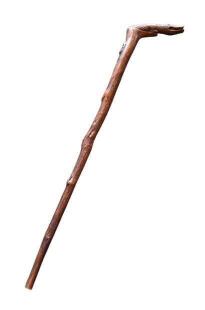One-piece carved wooden cane with crocodile-shaped...