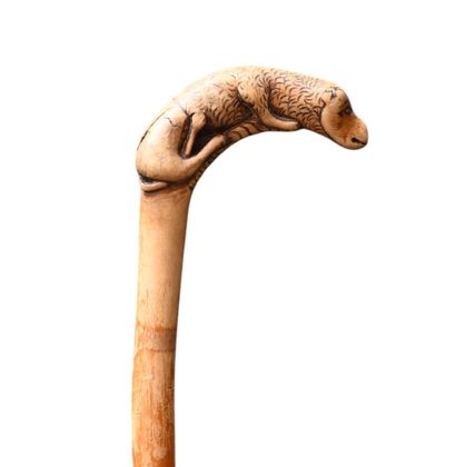 Carved wooden cane with zoomorphic handle,...