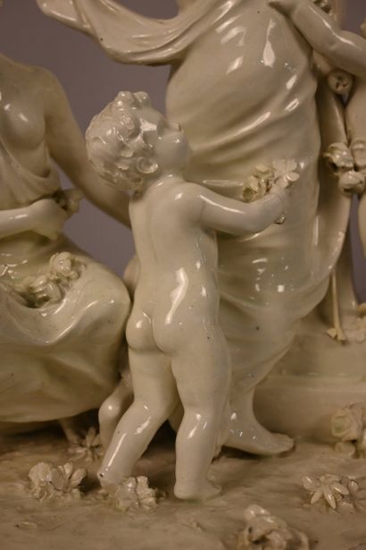 Groupe allégorique au faune, faïence émaillée,...