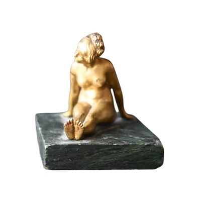 Small ormolu figure of a reclining female...