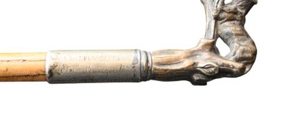 Walking stick with brass handle featuring...