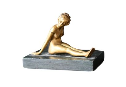 Small ormolu figure of a reclining female...