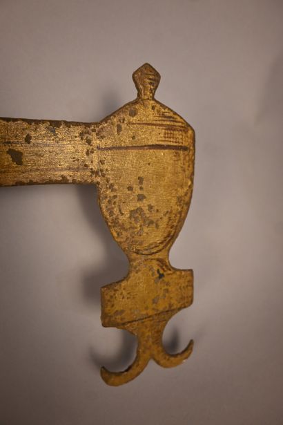 Painted and gilded wrought-iron shop sign,...