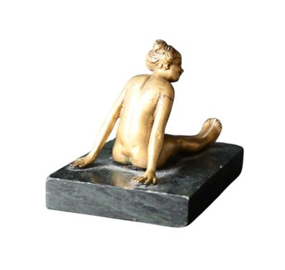 Small ormolu figure of a reclining female...