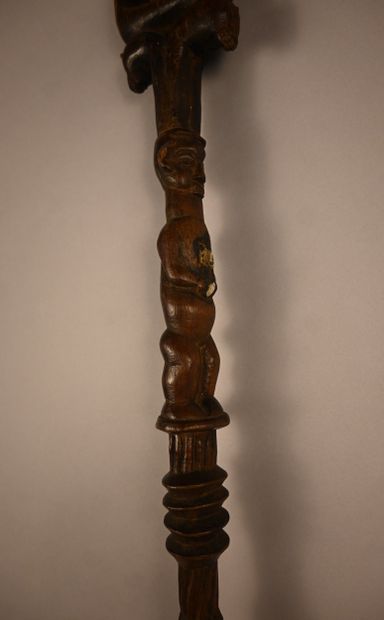 Yaka stick with two carved figures, first...
