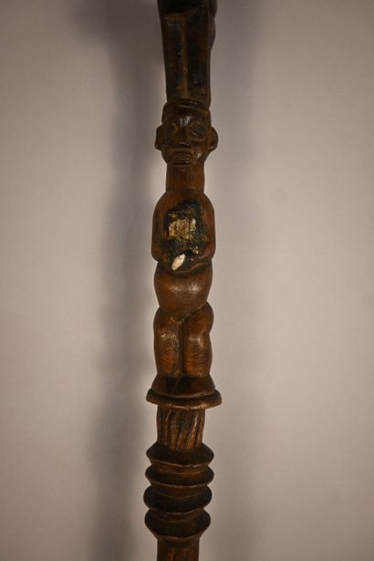 Yaka stick with two carved figures, first...