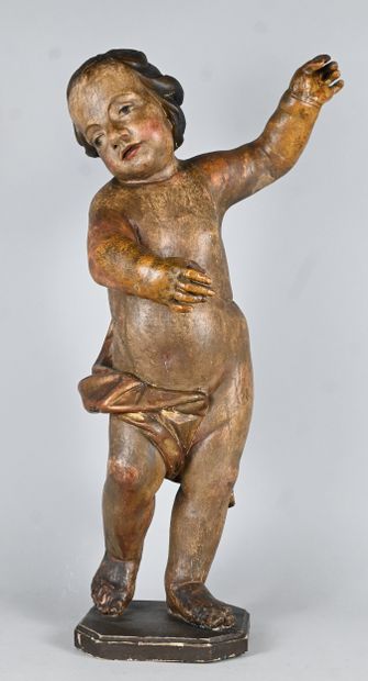 Baroque standing angel in carved and gilded...