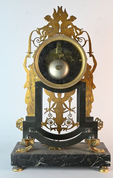 Empire ormolu clock with winged figures on...