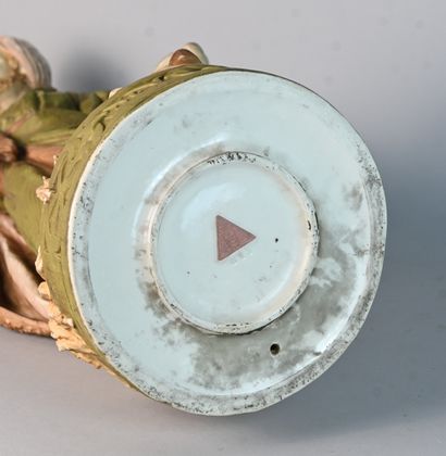 Royal Dux, polychrome porcelain water carrier
Standing...