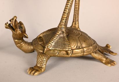 Pair of bronze candelabras with waders and...