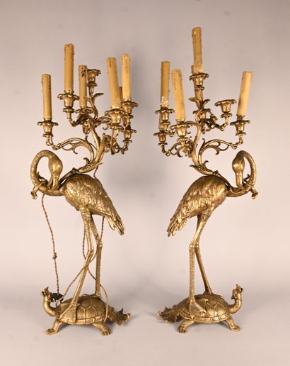 Pair of bronze candelabras with waders and...