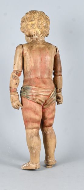 Carved wooden articulated doll, 19th century
Carved...