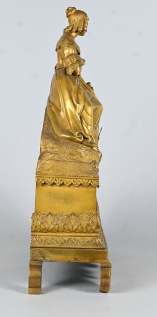 Gilt bronze clock with romantic subject,...
