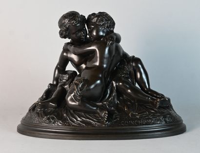 Group in patinated bronze of two embracing...