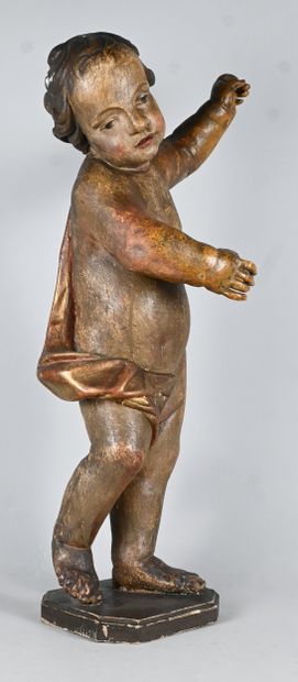 Baroque standing angel in carved and gilded...