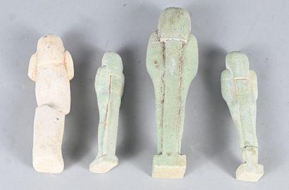 Set of four earthenware oushebtis, in the...