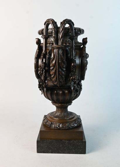 Bronze vase decorated with children and garlands,...