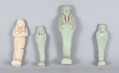 Set of four earthenware oushebtis, in the...