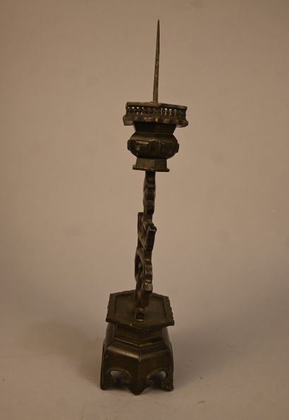 Pewter candlestick with openwork decoration...