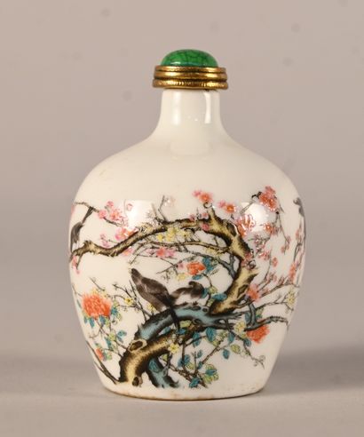 Porcelain snuff bottle decorated with prunus...
