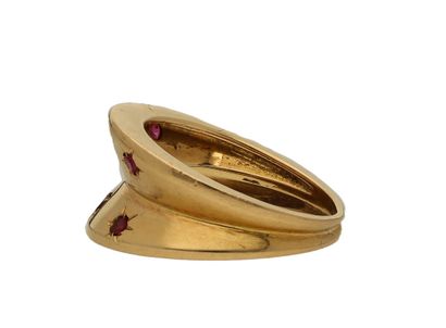 Vintage ruby star ring
Set with round-cut...