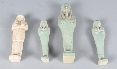 Set of four earthenware oushebtis, in the...