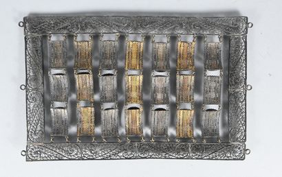 Filigree silver panel with suspended elements...