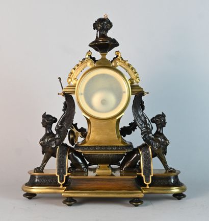 Patinated bronze and gilt bronze clock with...
