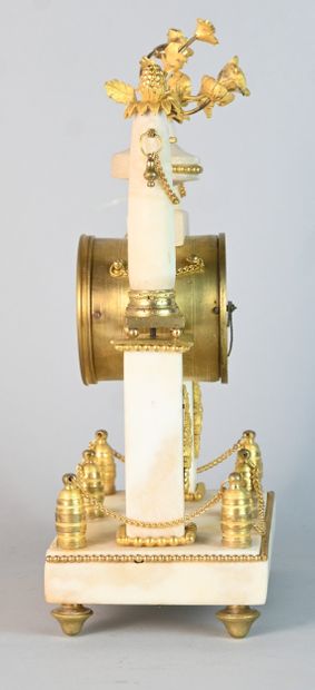 Gilt bronze clock in the Louis XVI style,...