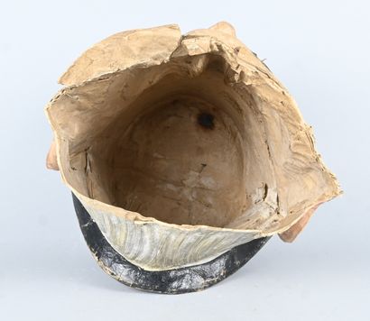 Polychrome papier-mâché mask of a male figure...