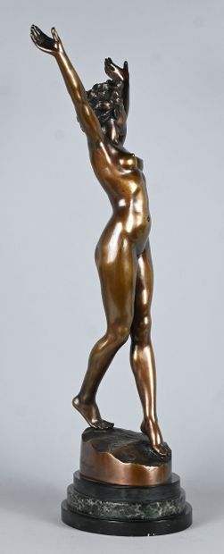 Youth, bronze statue of a nude female figure...