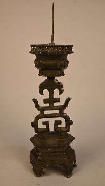 Pewter candlestick with openwork decoration...